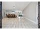 Spacious dining area with tiled floor and elegant dining set open to other living areas at 3238 Cullendale Dr, Tampa, FL 33618