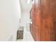 Laundry room with tiled floors, storage cabinet and a washer and dryer at 3238 Cullendale Dr, Tampa, FL 33618