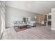 Spacious living area with an open floor plan, modern furniture, and sleek flooring at 3238 Cullendale Dr, Tampa, FL 33618