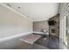 Spacious living room with tile floors, a stone fireplace, and modern recessed lighting at 3238 Cullendale Dr, Tampa, FL 33618