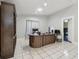 Office space with built in shelving, large desk, and bright lighting at 3238 Cullendale Dr, Tampa, FL 33618