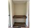 Walk-in closet featuring wood floors and granite desktop at 3411 Teeside Dr, New Port Richey, FL 34655