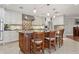 Kitchen with granite countertops, stainless steel appliances, and a central island at 3906 Floyd Rd, Tampa, FL 33618