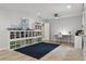 Large playroom featuring tile floors, recessed lighting, and built in storage at 3906 Floyd Rd, Tampa, FL 33618