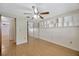 Bedroom featuring built-in shelving and large closet with mirror doors at 4012 Woodacre Ln, Tampa, FL 33624