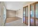 Inviting living room with neutral paint, wood-look flooring, and a bright window at 4012 Woodacre Ln, Tampa, FL 33624
