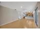 Open-concept living room with a staircase and an open view of the kitchen at 4012 Woodacre Ln, Tampa, FL 33624