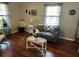Cozy living room with hardwood floors, neutral walls, and decorative accents at 4074 Parkway Blvd, Land O Lakes, FL 34639