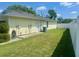 Side yard with privacy fence at 4074 Parkway Blvd, Land O Lakes, FL 34639