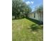 Side yard with a lake view at 4074 Parkway Blvd, Land O Lakes, FL 34639