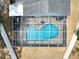 Aerial view of the private backyard pool and screened-in patio at 4302 Longfellow Dr, Plant City, FL 33566