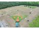 Aerial view of the park's baseball diamond, framed by trees at 4302 Longfellow Dr, Plant City, FL 33566