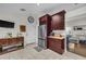 Bright kitchen featuring stainless steel appliances, ample counter space, and open access to the living area at 4302 Longfellow Dr, Plant City, FL 33566