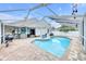 Screened-in pool area with a patio, barbeque grill, and view of the patio seating at 4302 Longfellow Dr, Plant City, FL 33566