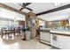 Kitchen and dining area combination with laminate floors, ample cabinet space and open layout at 4314 12Th Street E Ct, Ellenton, FL 34222