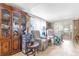 Spacious living area showcasing laminate flooring and comfortable seating arrangements at 4314 12Th Street E Ct, Ellenton, FL 34222