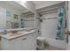 Bathroom featuring a vanity with a granite countertop, updated hardware, and tile flooring at 5036 Glenhurst Ln, New Port Richey, FL 34653