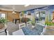 Game room features mural, foosball table, and dining area, perfect for entertaining guests and Gathering at 5081 72Nd N Ave, Pinellas Park, FL 33781
