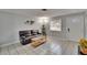 Bright living room featuring neutral walls, tile flooring and a front window at 5081 72Nd N Ave, Pinellas Park, FL 33781