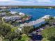 Waterfront condo complex with boat docks on a scenic waterway near lush greenery at 5191 Salmon Se Dr # C, St Petersburg, FL 33705