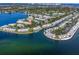 Aerial view of a waterfront community with a network of canals, docks, and lush landscaping at 5191 Salmon Se Dr # C, St Petersburg, FL 33705