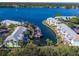 Waterfront community featuring condo buildings with boat docks, lush landscaping, and tranquil canal views at 5191 Salmon Se Dr # C, St Petersburg, FL 33705