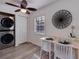 Cozy dining nook featuring a stylish ceiling fan and in-unit washer and dryer at 5191 Salmon Se Dr # C, St Petersburg, FL 33705