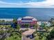Beautiful waterfront home with large swimming pool, dock, palm trees, and stunning ocean views at 5191 Salmon Se Dr # C, St Petersburg, FL 33705