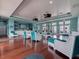A bright lounge area featuring elegant seating, ceiling fans, and waterfront views at 5191 Salmon Se Dr # C, St Petersburg, FL 33705