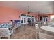 Outdoor patio area with comfortable seating, dining tables, and serene views at 5191 Salmon Se Dr # C, St Petersburg, FL 33705