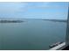 Vast waterfront view under a blue sky showing a dock area, with clear water and distant land at 5200 S Brittany S Dr # 1605, St Petersburg, FL 33715