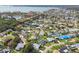 Aerial view of a residential community with a mix of homes near a large lake at 5235 42Nd S St, St Petersburg, FL 33711