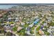 Aerial view of a coastal neighborhood with varied roof colors and waterfront access at 5235 42Nd S St, St Petersburg, FL 33711