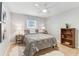 This bedroom features a ceiling fan, large bed and decor, offering a serene retreat at 5235 42Nd S St, St Petersburg, FL 33711