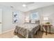This bedroom features a ceiling fan, large bed and decor, offering a serene retreat at 5235 42Nd S St, St Petersburg, FL 33711