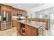 Spacious kitchen features granite countertops, stainless steel appliances, and ample cabinet space at 5235 42Nd S St, St Petersburg, FL 33711