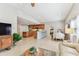 Open-concept living room seamlessly connects to the kitchen and dining area, great for entertaining at 5235 42Nd S St, St Petersburg, FL 33711