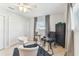Bright office space with glass top desk, white modern chairs, and natural light at 5235 42Nd S St, St Petersburg, FL 33711