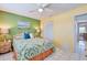 Comfortable bedroom with bed, closet, and colorful walls and decor for a relaxed feel at 5356 81St N St # 26, St Petersburg, FL 33709