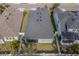 This aerial view reveals the home's roof, fenced yard, and proximity to adjacent properties at 5538 Spanish Moss Cv, Bradenton, FL 34203