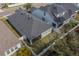 This aerial view showcases the home's backyard with its fence, roof, and landscaping at 5538 Spanish Moss Cv, Bradenton, FL 34203