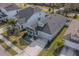 Charming single-Gathering home with a well-manicured lawn, inviting front porch, and a two-car garage at 5538 Spanish Moss Cv, Bradenton, FL 34203