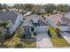 Charming single-Gathering home with a well-manicured lawn, inviting front porch, and a two-car garage at 5538 Spanish Moss Cv, Bradenton, FL 34203
