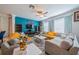 This inviting living room offers a comfortable seating arrangement, great natural light, and stylish accents at 5538 Spanish Moss Cv, Bradenton, FL 34203