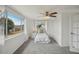 Cozy bedroom with a large window and ample natural light at 5620 Perkin Dr, New Port Richey, FL 34652