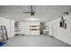 Spacious garage with ample storage, laundry area, and room for multiple vehicles at 5620 Perkin Dr, New Port Richey, FL 34652