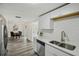 Modern kitchen open to the dining room at 5620 Perkin Dr, New Port Richey, FL 34652