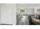 Spacious living room with hardwood floors and natural light at 5620 Perkin Dr, New Port Richey, FL 34652