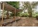 Backyard showcasing a covered deck area, perfect for outdoor entertaining at 601 N Franklin St, Plant City, FL 33563