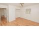 Cozy bedroom featuring stylish wood floors and a well-lit closet, offering ample storage at 601 N Franklin St, Plant City, FL 33563